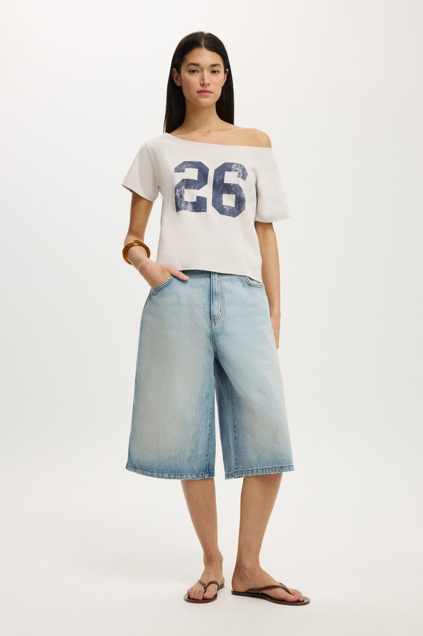 The Sporty Off Shoulder Graphic Tee