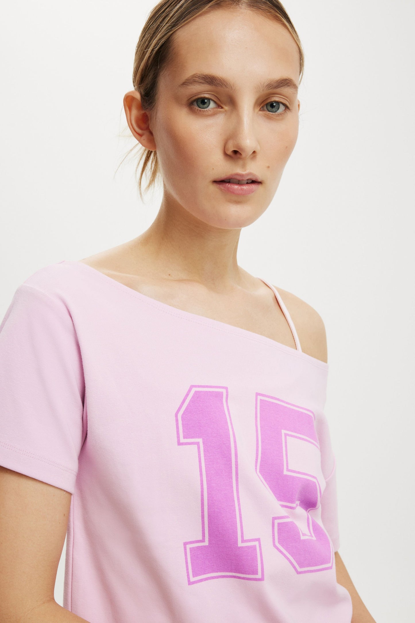 The Sporty Off Shoulder Graphic Tee