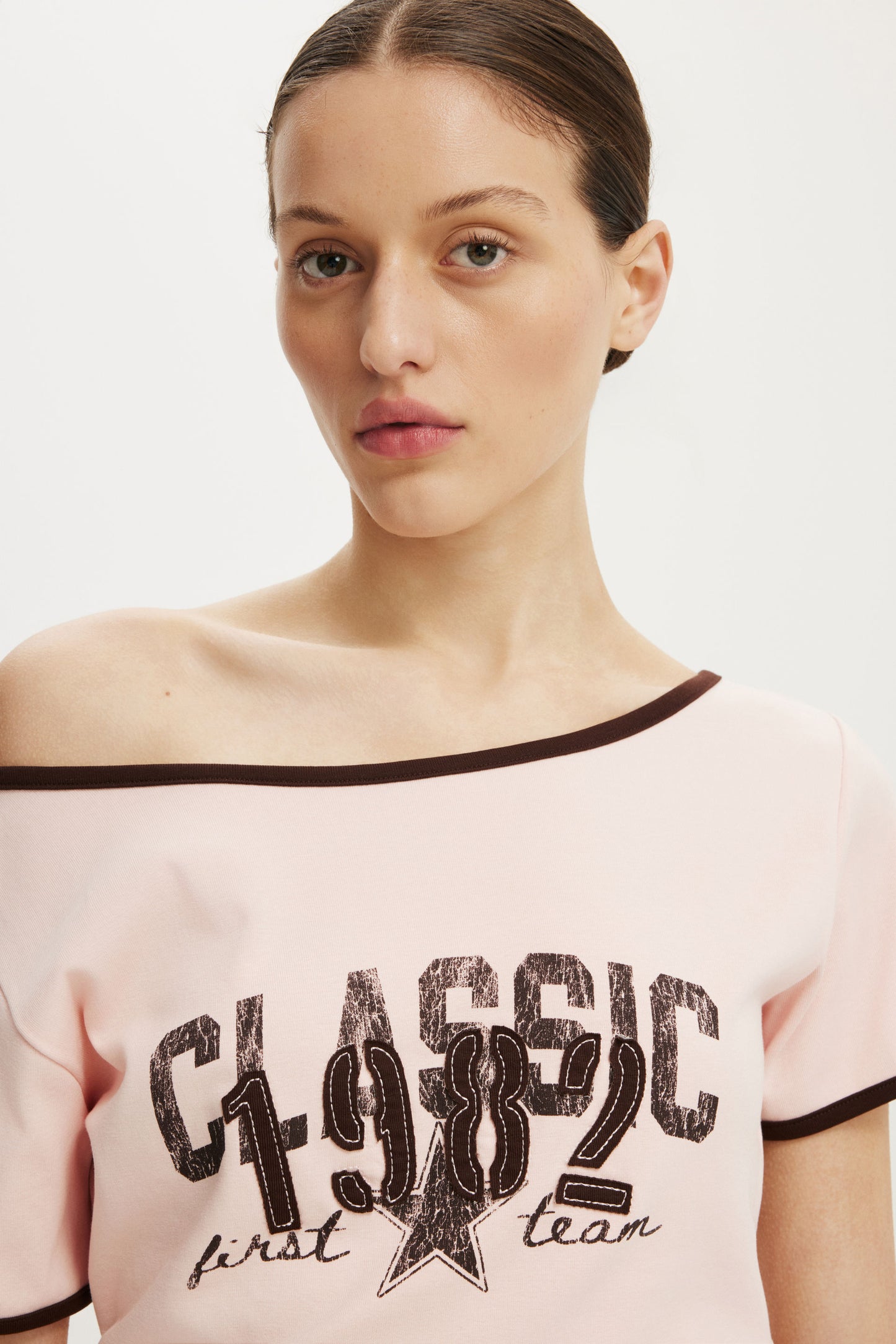 The Fitted Off Shoulder Graphic Tee