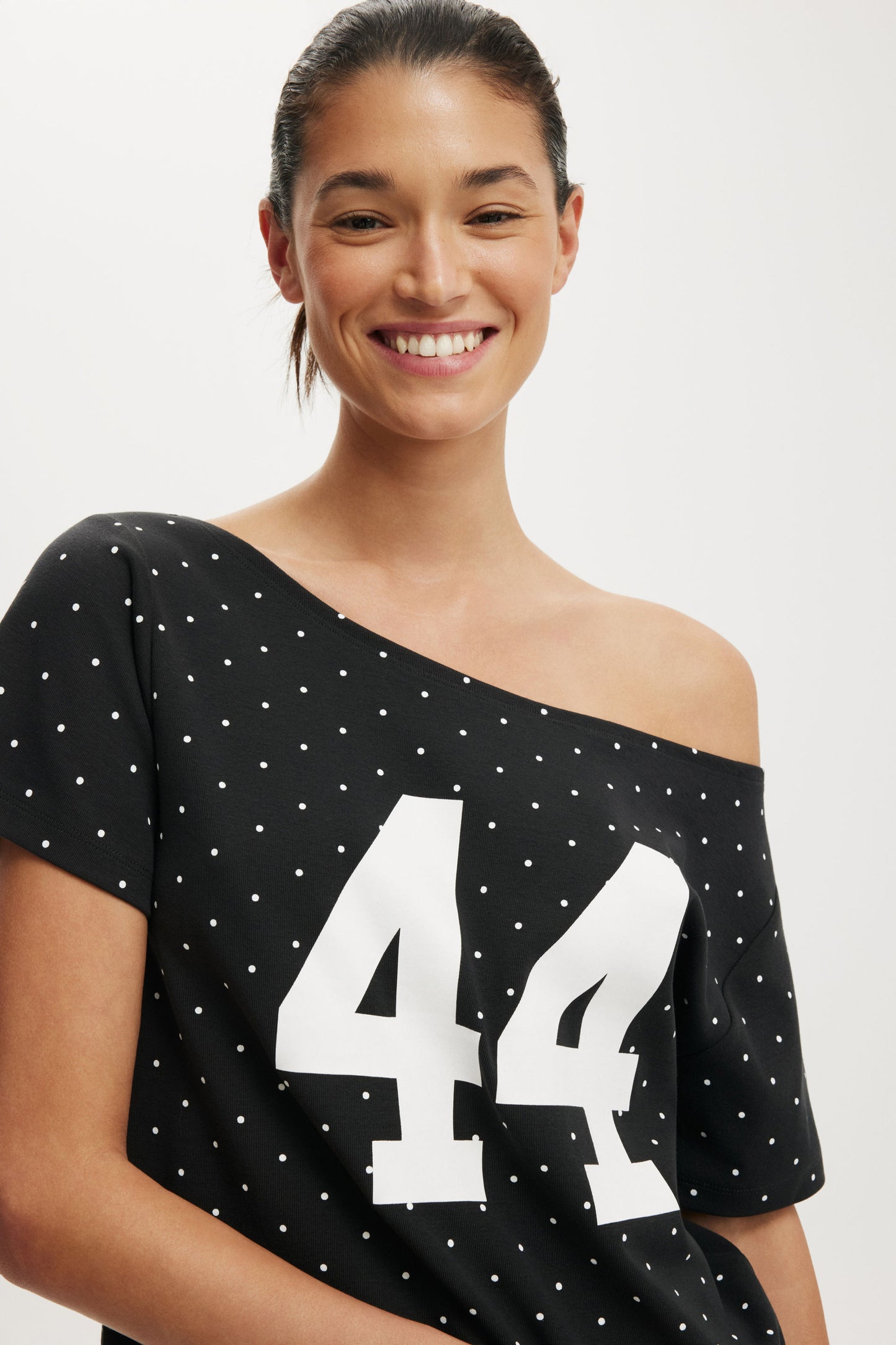 The Sporty Off Shoulder Graphic Tee